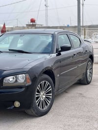 جارجر 2009 باسمي سنويه لل2032 كير ومكينه جدد شادهن وجاهزة من كلشي السي...