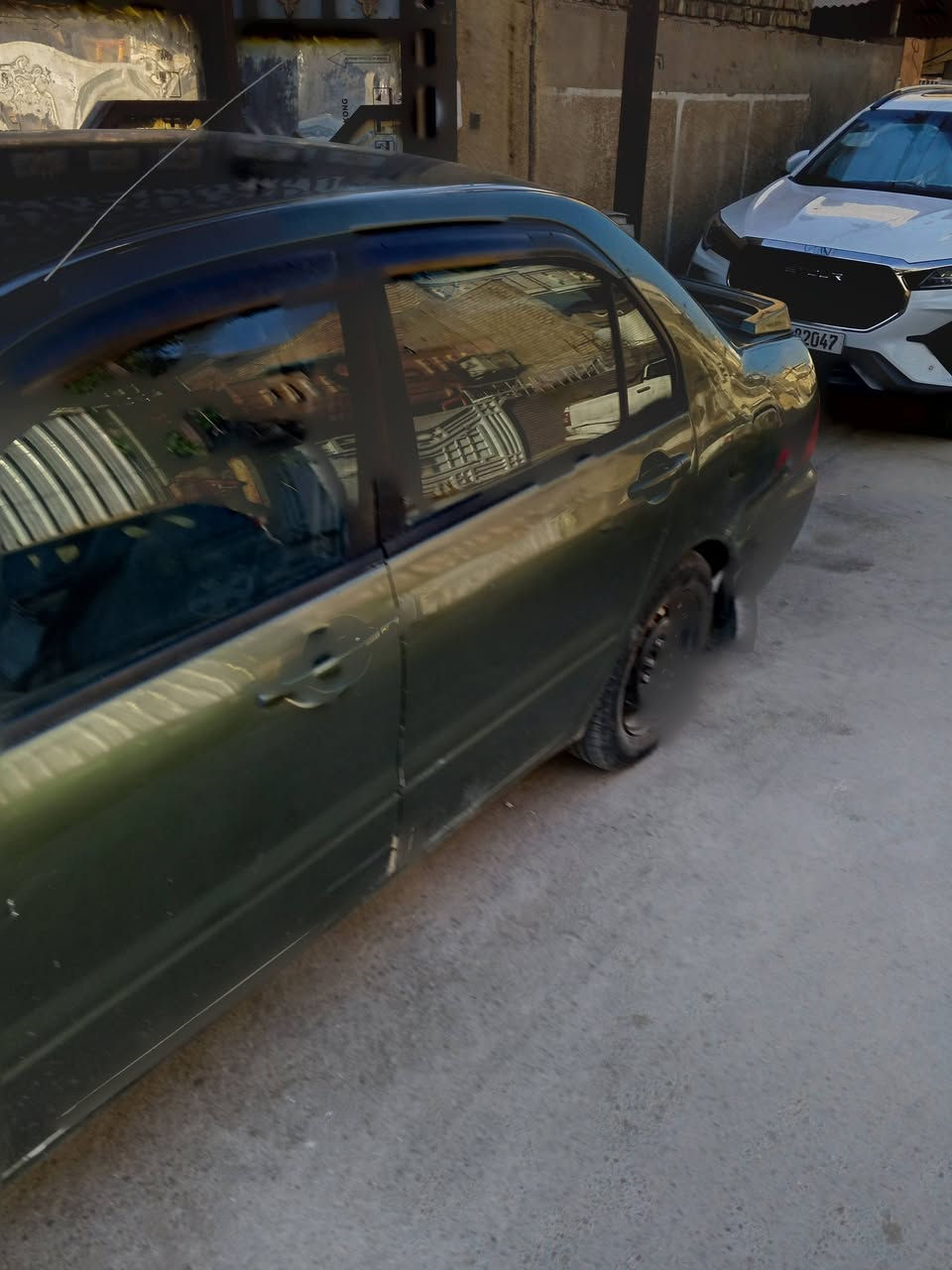 سلام عليكم لانسر موديل 2002 سنويه 2029 هزه جديد بسمي سياره مصبوغ عام كانو تكسي وتحولة خصوصي بغداد تلفون، *********** ميكانيك كل نضيف شاشه كامرات كير وتماتيك
