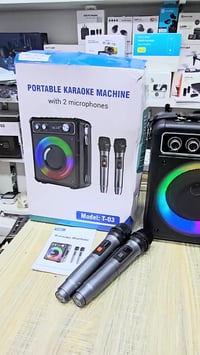 كاريوكي محمول • ميكروفونين لاسلكيين • بطارية ٦-٨ ساعات