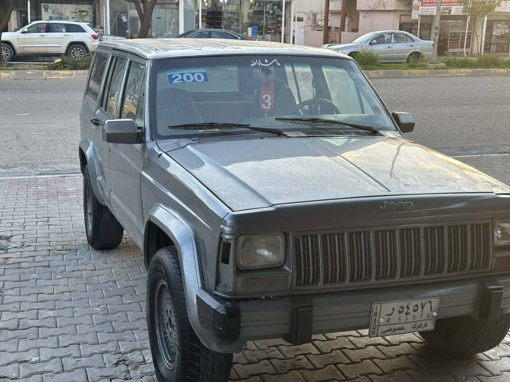 جيب شروكي موديل 1993كير اوتوماتيك بدون ضربه صبخ جمالي كيرومحرك بيلاد سنوي مشروع بسه منتهي سعر 35بي مجال *********** كركوك, العراق
