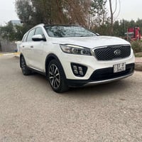 كيا سورنتو خليجي  رقم بغداد الماني بسمي  لون ابيض  موديل ٢٠١٧ ٦ سلندر ...