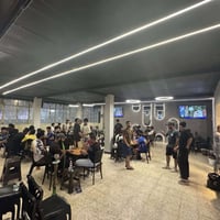 كوفي • صالة العاب • قرب صورة الامام