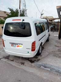 سياره جنبي 2014 مصفر غرامات وهيئه باسمي وبيها صبغ السياره 07716529119