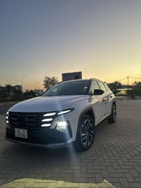 :هونداي توكسان 2025 خليجي   اللون توكلر ابيض والقماره سوده /مواصفات ال...