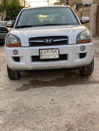 توسان ٢٠٠٩ • ماشي ١٣٥٠٠٠ • رقم بغداد