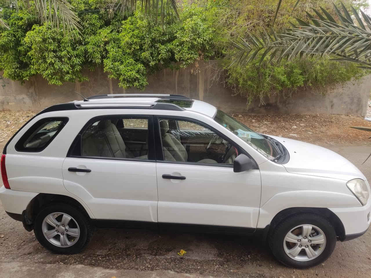 سبورتج 2010 مكينة 2000 رقم بغداد دولي سيارة جاهزة مال جناي بيها رش قطعتين جاملغ وبنيد مكاني بابل ***********
