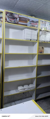 رفوف محل • نضيفه • استعمال قليل