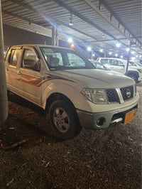 نيسان نافارا • بصرة كرمه علي • اوراق