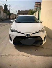 كورلا موديل 19 SE بلاص فول مواصفات بصمه و فتحه لون  ابيض جديدة رقم بغد...