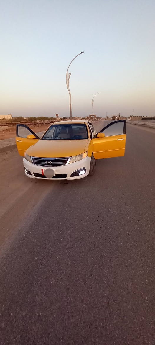 السلام عليكم سياره اوبتيمه 2009رقم بغداد باسمي مكينه وكير مال حاويه شرط فرممه حداديه كله مال حاويه حداديه لخلفيه هم مال حاويه تبريد شغال ثلج تخم تاير جديد  كهربائية كلها شغاله دعاميه جديدة عبوه فيت بم حاويه نوزلات حاويه سياره مكفوله عدة ضربه جهة اليمنه جاملغ وبنيد وبيه تبديل فخذ سنوية ل2028 مكان السيارة ديوانيه ***********
