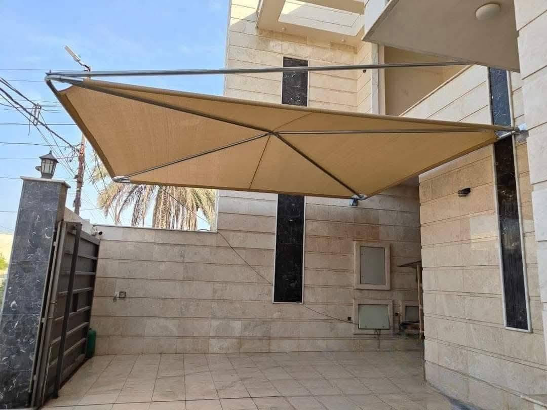 🛠️من اعمال معمل بغداد 🛠️
المظلات الهرميه الثابته غطاء المظلة  كوري مصمم للأجواء الصحراويه والجافه يحتوى على مسامات لتسمح بمرور الهواء نسبه العزل للمطر 50% و نسبه العزل للشمس 95%.
تحمي السياره من الحالوب ١٠٠٪
مصنع من خيوط البولي اثيلين والياف الفايبر 
اوتعمل على تقليل الحرارة الى  12 درجة ويحافظ على البشره والاجزاء الداخلية للسيارة وهو صديق للبيئة ومفيد لنمو النباتات متوفر بجميع  الالوان. 🌝
يكون التثبيت من جهة واحدة🏗
♦️نوع التغليف قماش كوري (ضمان 5 سنوات)
♦️ألاعمده بوري دأئري 5الى6أنج 2ونص ملم⭕️
♦️ألهيكل الداخلي بوري دائري2 انج 2ملم🗜
♦️نوع ألحديد ألمغلون  مع تثبيت براغي🔩
القياسات حسب الطلب تتوفر (١٠)الوان مع الضمان🌈
جميع الخدمات التي تحتاج لها متوفرة لدينا, خدماتنا
🟢- المظلات الثابته الهرميه الشمسية
🟢- المظلات الثابته المقوسة الشمسية المطريه 
🟢-المظلات الكي سبان 
 لمعرفة المزيد، يرجى الاتصال بنا أو مراسلتنا
***********
العمل بكافة محافضات العراق
