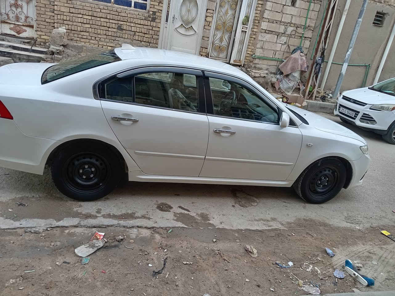 سلام عليكم  كيه اوبتيما 2009خليجيه  بسمي  مكينه وكير وحداديه  ومشط وتخم تاير  وتبريد ثلج شرط  رقم بابل انكليزي  . سياره مكفوله مابيه اي قطعه تبديل مكان الناصريه مركز  اتصال على رقم ***********
