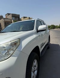 برادو موديل 10 اربعه رقم اربيل الجديد ماشيه 136 حقيقي  كير محرك مكفولا...