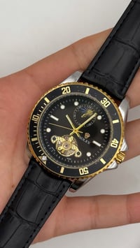 اوتوماتيك • تكويك • ساعة