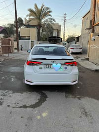 كورلا هايبرد 2024 شكل الخليجي  علامه سوده فول للاخير  ماشيه 34 الف رقم...