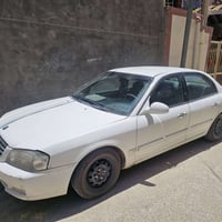 اوبتيما • ٢٠٠١ • بابل نادر ٢