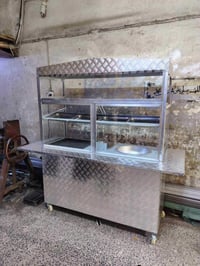 شواية همبركر وفنكر وفلافل  السعر 350 الالف وبيها مجال للتواصل 07727988...