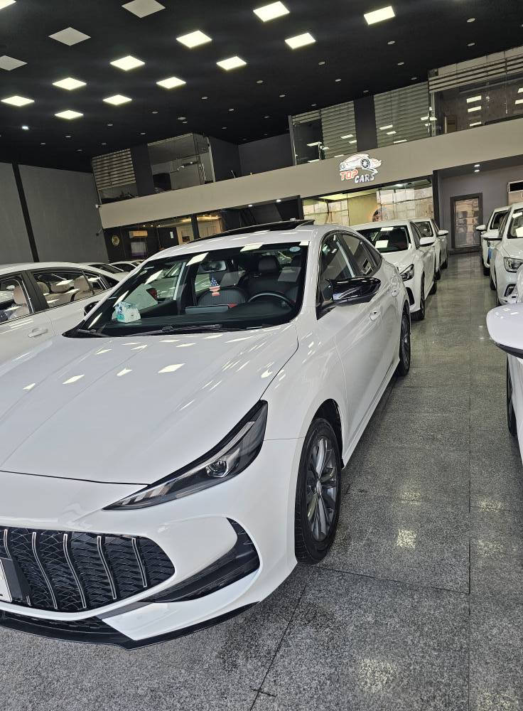 ئێم جی  MG GT 2025 Sport
تەنیا 7 هەزار ڕۆیشتووە.زۆرپاکە.
فول مواصفات.بەصمة.سلاید.برێك کارەبایی.
شاشەو 5 كاميرا.ئاوێنە شەفت.لايت.زينۆن.
مكان  أربيل.   ١٠٠ متری معرض تۆپ کارس 
سعر 117ورقة   موبایل    *********** أربيل, العراق

