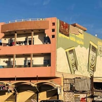 عمارة تجارية • ٣٢٥م • ١٠شقق ٥محلات