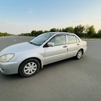 سيارة لنسر للبيع موديل 2006 محدثة 2009 رقم نينوى دولي سنويا الى 31 بيه...