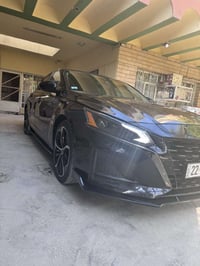 التيما 2023 • اسود • بصمه