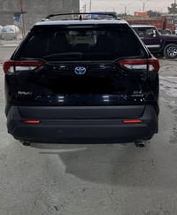 RAV4 2024 ماشية 26 الف هايبرد AWD رقم بغداد لا صبغ ولا تبديل فقط بارد ...