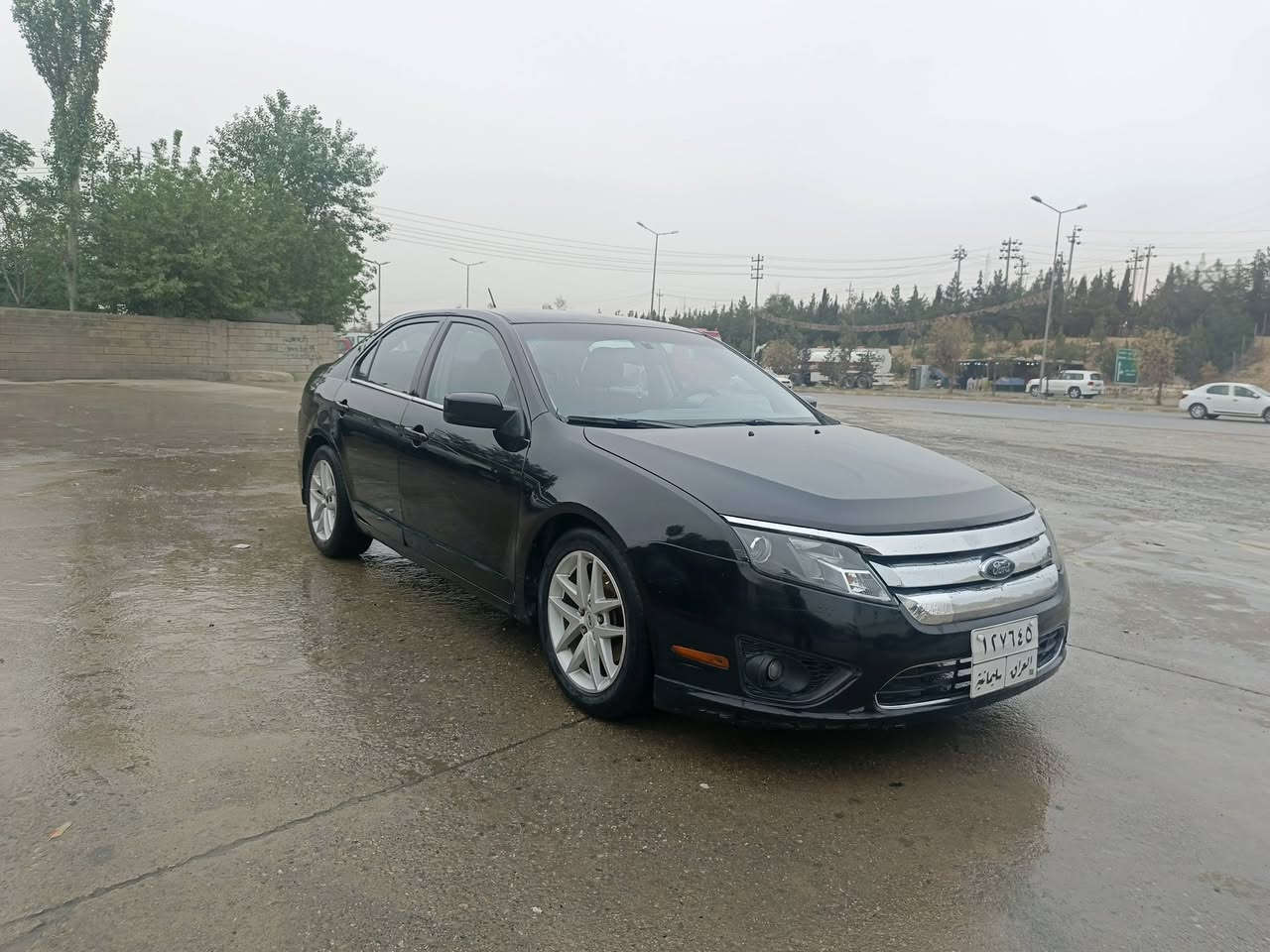 فورد فیوژن 2010 se  سەیارەکە دو پەڵەی بۆیاخە شوێن تەکیە نرخ 80 $ ژم ***********
