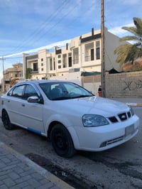 ابتره 2004 محرك كير شرط  كير عادي  تبريدثلج ❄️  سياره  جاهزه  تخم تاير...