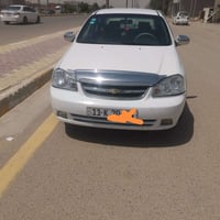 وبركاته سياره اوبترا موديل 2011محرك كير صدر تبريدكله جديد  تخم تاير جد...