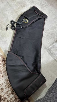 حزام كتف • مساج اهتزازي • تدفئة