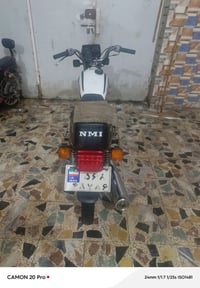 دراجة نارية • موديل 11 • أوراق باسمي