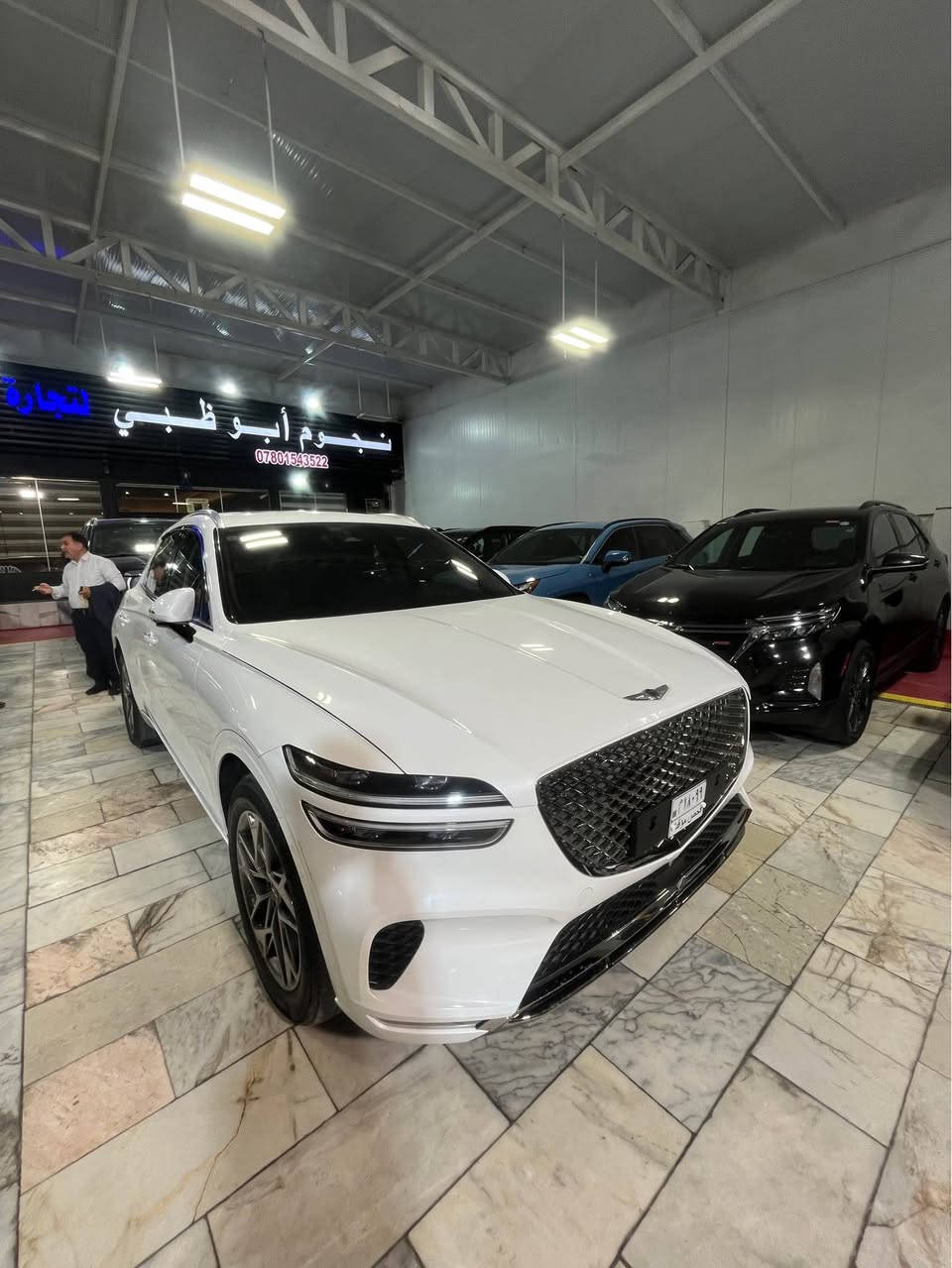 🚗 للبيع: جنيسيس GV70 م 2023
📍 مكان السيارة: النجف الأشرف
📞 للتواصل: ***********
💰 السعر: 300 ورقة – قابل للتفاوض
📊 المسافة المقطوعة: 35 ألف ميل
🛠️ المحرك: 4 سلندر – 2500cc توربو

⚠️ حالة السيارة
• وارد أمريكي (دخول جديد)
• الأضرار: حادثها ربع الدعامية فقط، وتم استبدالها بقطعة أصلية بنفس اللون (بدون صبغ)
• صور الحادث مرفقة 

⚙️ المواصفات (فول مواصفات):
• فتحة سقف بانوراما
• بصمة تشغيل
• تشغيل عن بعد
• مقاعد جلد (تدفئة + تبريد + مساج) مع ذاكرة خزن لوضعيات المقاعد
• رادارات كاملة (أمامية + خلفية + جانبية)
• شاشة وسطية كبيرة
• كاميرا خلفية
• وبقية المواصفات المعروفة

📌 تفاصيل إضافية
• دخول جديد بدون رقم (تترقم جميع المحافظات عدا الإقليم)
• المنفيس باسم المالك
• لون السيارة: أبيض النجف, العراق
