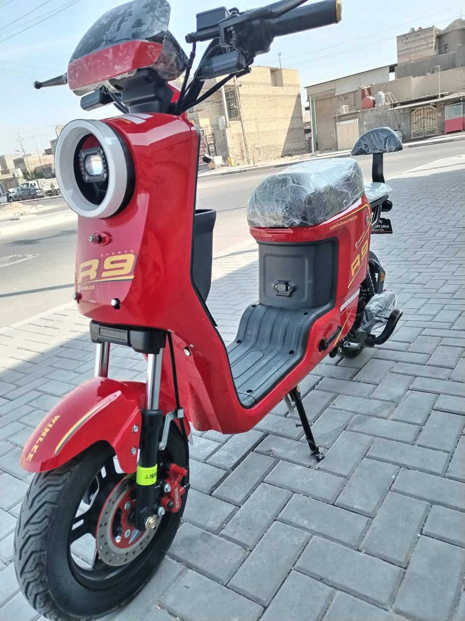 🚀 R9 موديل 2026: ملكة الشحن والقوة ! 🚀              425. !!!
الجيل الجديد من R9 يجمع بين الفخامة والتحمل.. صُممت لتكون رفيقك الأقوى في كل مشوار!

✨ أبرز مميزات R9 الجديدة:

💪 عزم خارق: محرك مطور لصعود المرتفعات بكل سهولة.

🏗️ هيكل فولاذي: (شاصي مدبل) يتحمل حمولة لغاية 200 كغم.

🛡️ أمان تام: مكابح ديسك أمامية وخلفية لاستجابة فورية.

☁️ راحة ملكية: مساعدات هيدروليكية لامتصاص أقوى الصدمات.

🛠️ مواصفات تقنية سريعة:

⚡ السرعة: انطلاق يصل إلى 80 كم/ساعة.

🖥️ الشاشة: لوحة ديجيتال LCD ذكية لمتابعة الشحن والسرعة.

💡 الإضاءة: منظومة LED قوية لرؤية ليلية واضحة.

🔘 الإضافات: نظام بصمة، تشغيل عن بعد، ومنبه ضد السرقة.

💰 السعر: [425 دينار عراقي وقابل للتفاوض ] 📍 📞 للحجز والاستفسار: [***********] للمزيد م̷ـــِْن المعلومات وأتساب مو شراي لاتجي ✅
