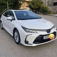 كورلا هايبرد 2024 مكفولة كفالة عامة فول مواصفات ماشية 30 رقم بغداد باس...