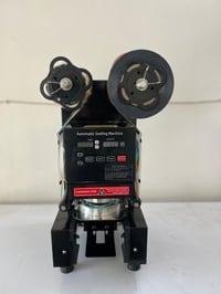 للبيع غالقة اكواب جديدة فول اوتماتيك 07705099603