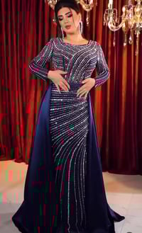 فساتين • نيلي قياس 48 • زيتوني قياس 44