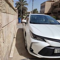 كورلا ٢٠٢٢ خليجي ابيض صدفي مكفوله ماشيه ٦٧ الف km بصمه فتحه فول عدا ال...