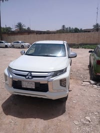 ميسبوشي L200 موديل 2020 بانزين كير عادي دفع رباعي السياره مكفوله كفاله...