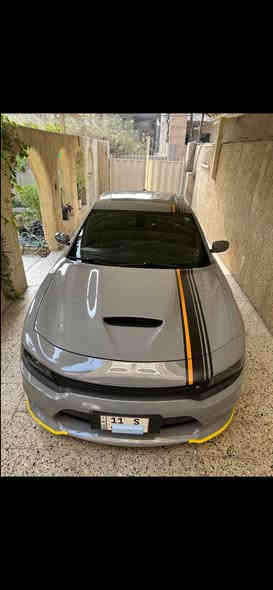 جارجر جي تي بلص ( اورنج ادشن) 
رقم بغداد بأسمي تحويل ثاني يوم
‏CHARGER GT PLUS ORANGE EDITION . 
الموديل :2022  . (خليجي) . 
العداد : ٣٤ الف 
بيها ملاحضتين بسيطات
الضمان : 3 سنوات او 60 الف 

المحرك : V6.  3.6L .
المواصفات :
* نسخة ORANGE EDITION. 
* خطوط طولية على الهيكل. 
* مكابح رياضية برمبو خاصة بالون البرتقالي. 
* جناح خلفي اسود. 
* ويل قياس 20 انچ اسود . 
* ستيرن رياضي . 
مقاعد رياضية من الشاموا مع خطوط بالون البرتقالي. 
* نقطة عمياء . 
* مصابيح أمامية زنون . 
* كشافات الضباب زنون . 
* المصابيح الأمامية مع LED . 
* حساسات . 
* شاشه كبيرة مع نظام ملاحة نفكيشن GPS .
* الشاشة مع اوپشنات SRT . 
* سستم صوت الپاين .
* فتحت سقف (سلايد) . 
* مقاعد أمامية كهربائية عدد 2 . 
* ذاكرة لحفظ وضعيات الجلوس (ميموري) . 
* مقاعد أمامية تبريد وتدفئة . 
* مقاعد خلفية تدفئة . 
* تشغيل عن بعد . 
* ستيرن كهربائي . 
* تدفئة ستيرن . 
* محدد سرعة . 
* تلفون بلوتوث . 
* كاميرا خلفية .
* مرايا متحسسة للاضاءة العالية .
* كير شفتر بالستيرن . 
* دخول ذكي (بصمة) .
* ⁠مكاني بغداد البلديات * ⁠***********
