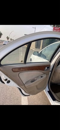 نيسان سني ياباني ٢٠١٠ رقم بغداد دولي  السعر ١٠٧  07730089997