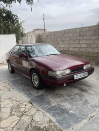 مازدا 1990 سنويه للـ 30 تنتهي بسمي  مصبوغه عام كير عادي للاستفسار 0771...