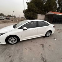 للبيع كورلا هايبرد وارد صين2024ماشيه 52الف قابل للزياده رقم بغداد تحوي...