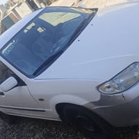 اسلام عليكم سياره نوع مازدا  2003 مرقوب  تدفئه تبريد  داخل جديد كامل  ...