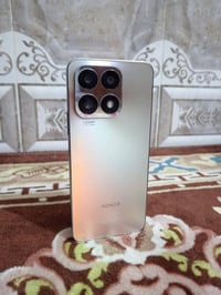 هونر X8A • ١٢٨ • بصمة جانبية