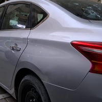 نيسان سنترا • فضي • مسجلة بغداد