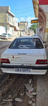 بيجو • ٢٠١٠ • العنون النجف