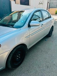 اكسنت • ٢٠٠٩ • گير اوتماتيك