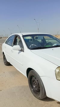 اوبترة 2011 نضيفه احله من الصور فقط بيهة باب السايق مصبوغ وطخه بل دوسه...