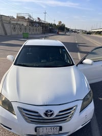 كامري 2007 رقم بابل مميز باسمي مصبوغه كلها وبيها نواقص من الحداديه وتب...