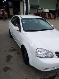 اوبترا موديل 2011 رقم بغداد مكان السياره البياع بيها قطعتين صبغ رقم بغ...